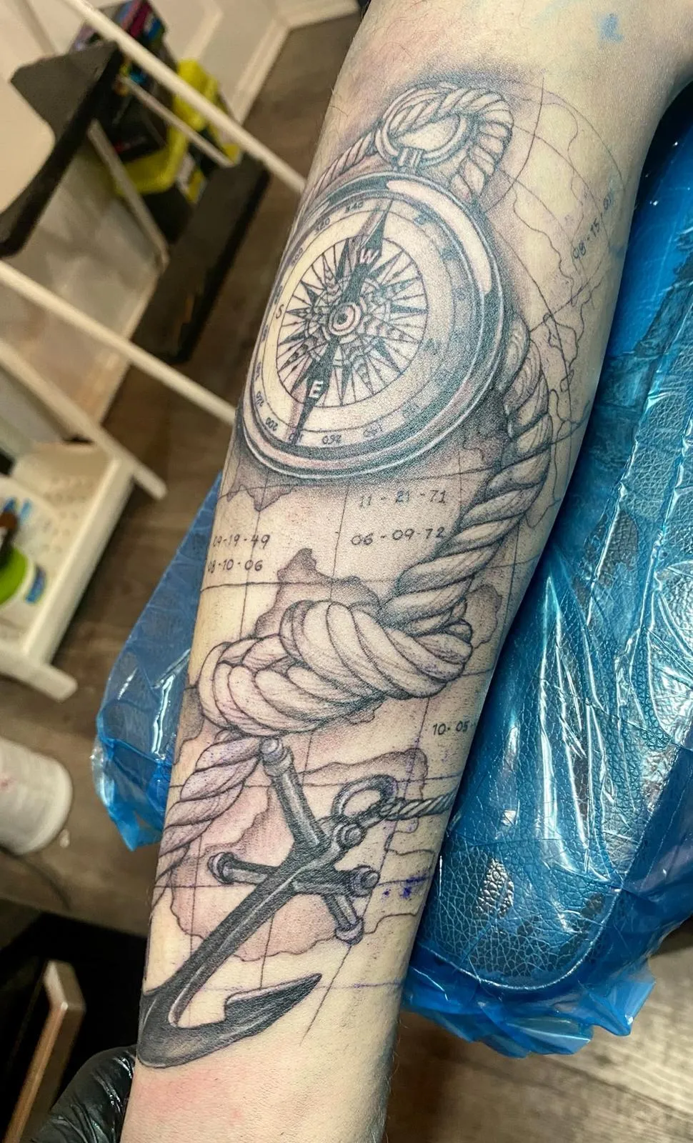 person with tattoo on right arm