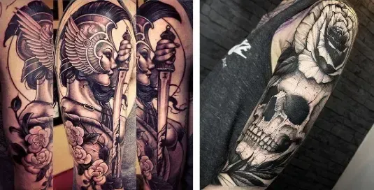 Tatouages réalistes et néo-traditionnels sur le bras – guerrier spartiate avec casque ailé et glaive entouré de roses, et crâne avec fleur en noir et gris.