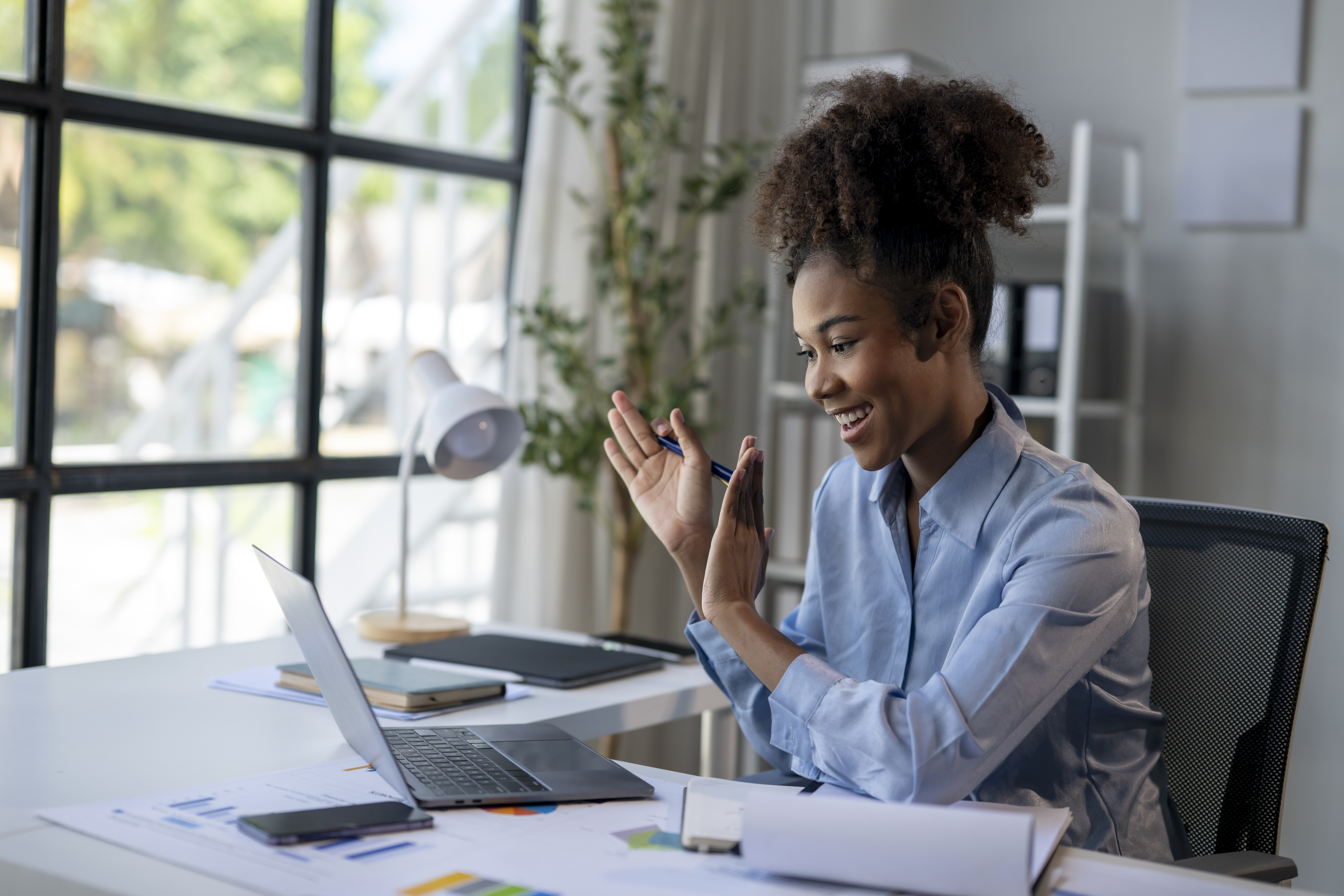 person holding orange flower petals