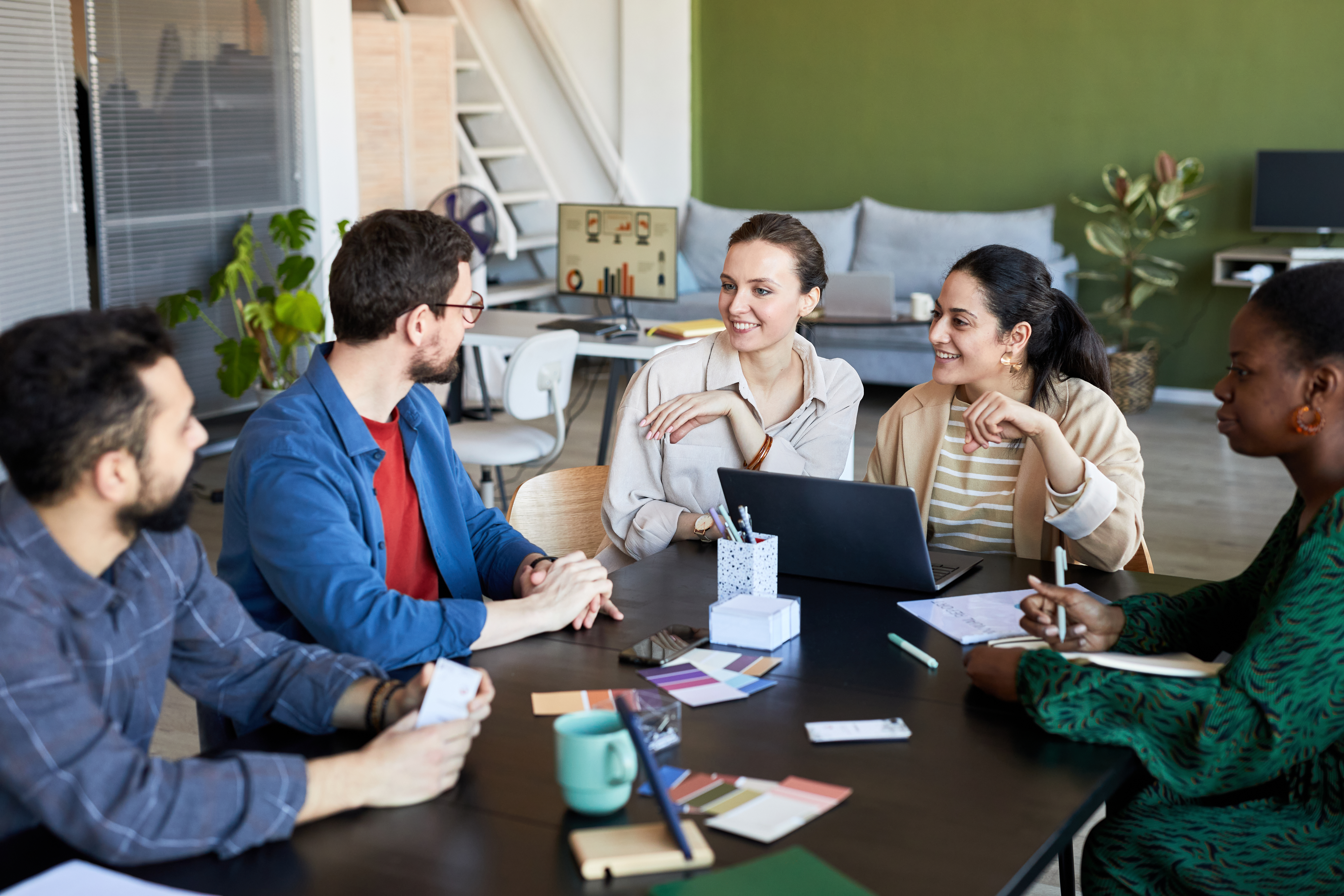 person holding orange flower petals