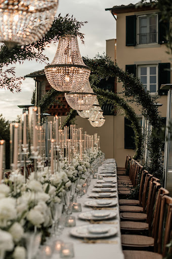 Long wedding dinner table with candles