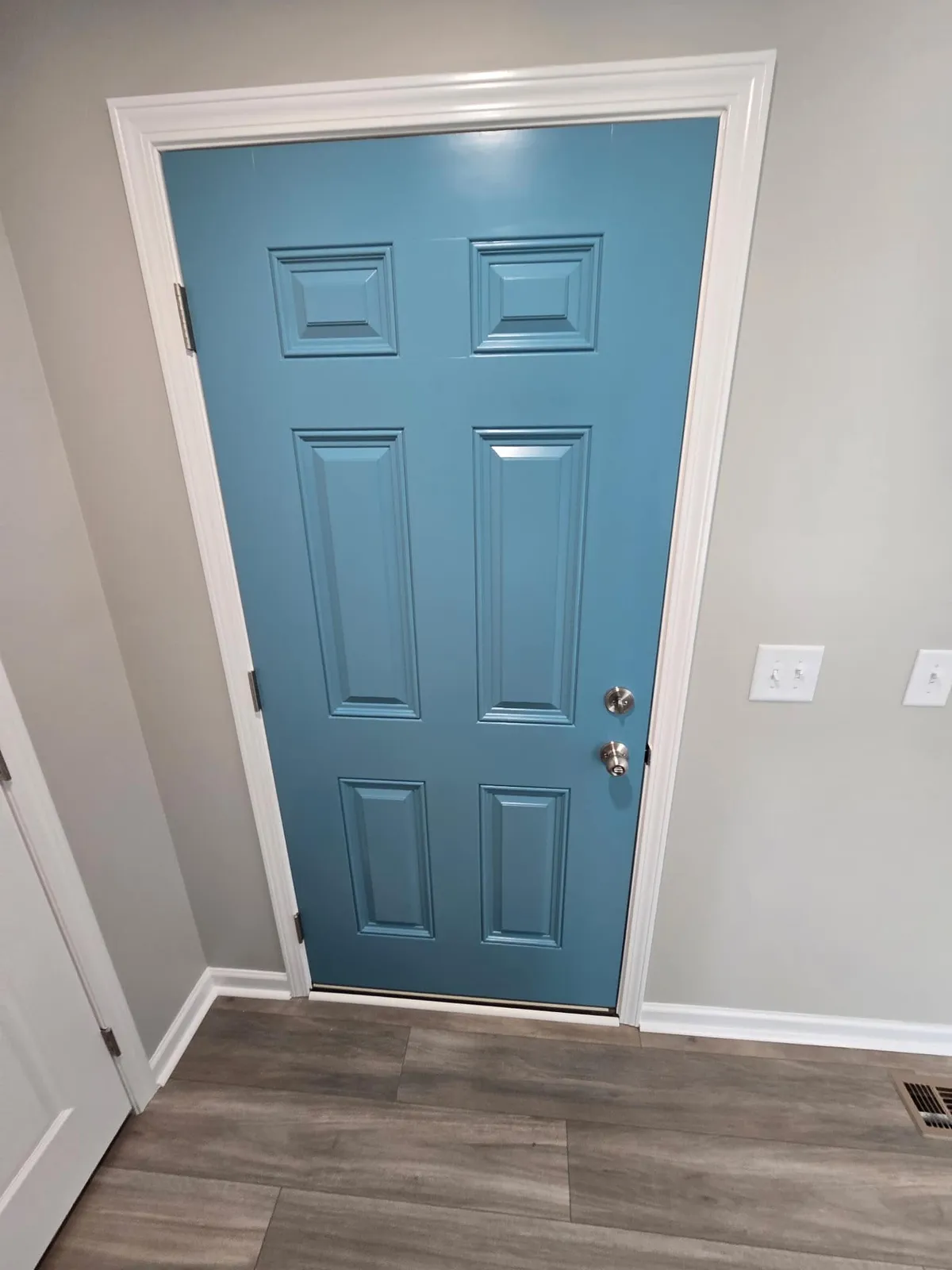Front door painted teal
