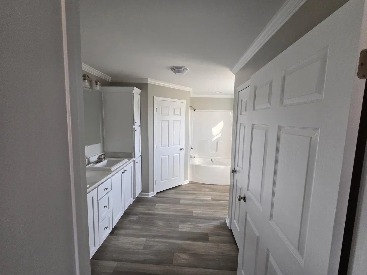 Hallway with freshly painted doors and trim
