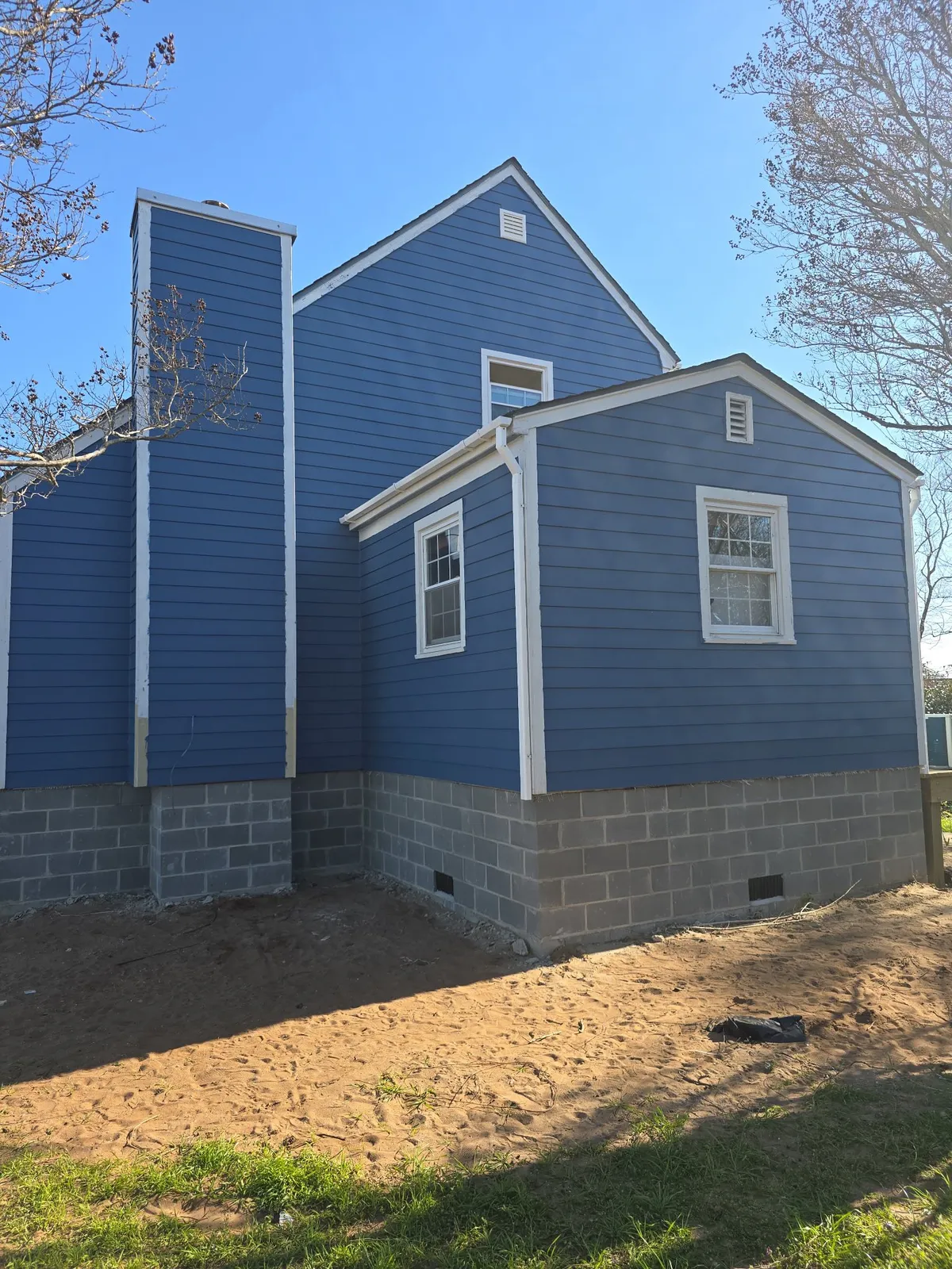 Blue siding exterior repaint in Morehead City NC
