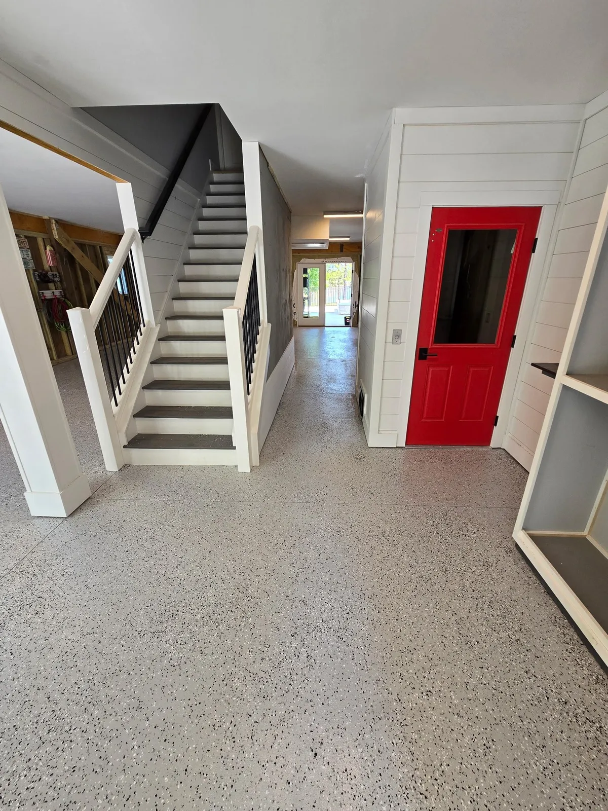 Staircase and red door in a Beaufort NC home
