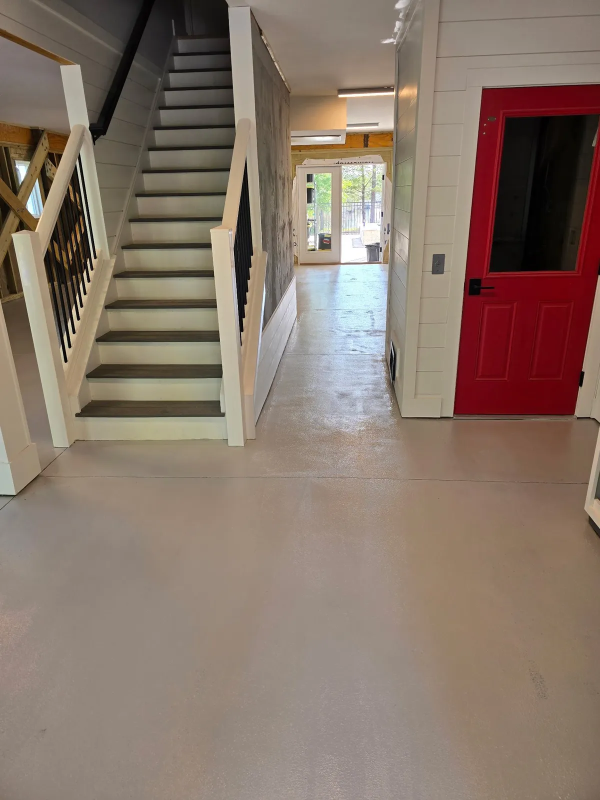 Stairway and red door in a Beaufort NC home