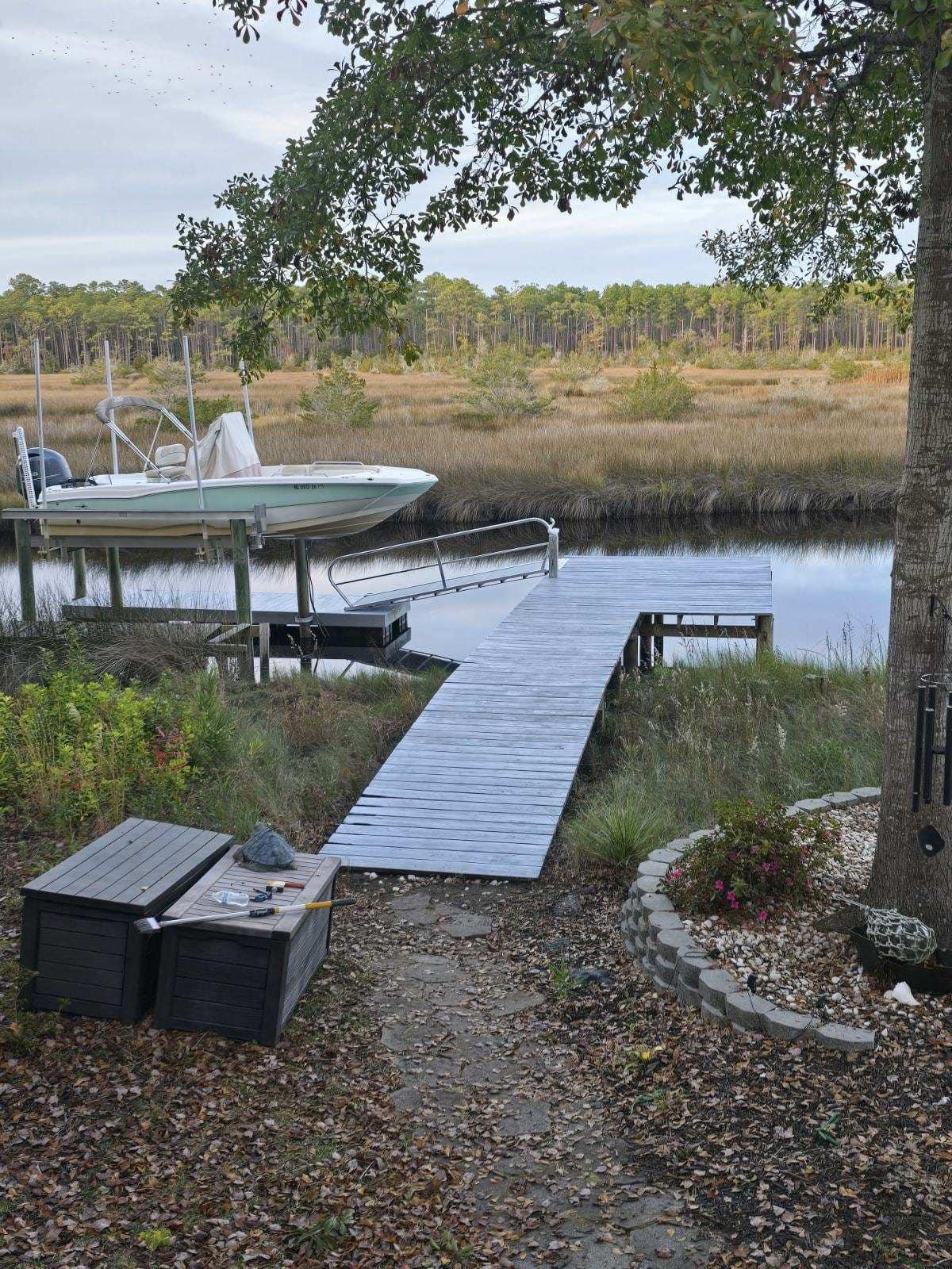 Dock and boat lift over the water in Atlantic Beach NC