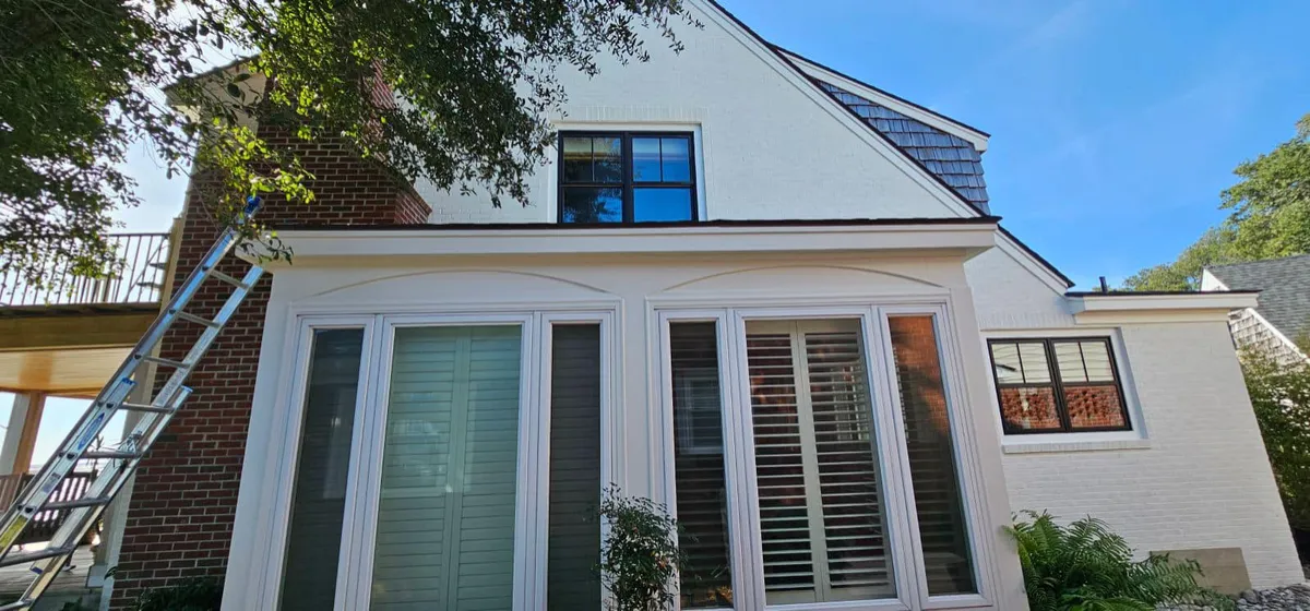 Sunroom and siding after exterior painting in Morehead City