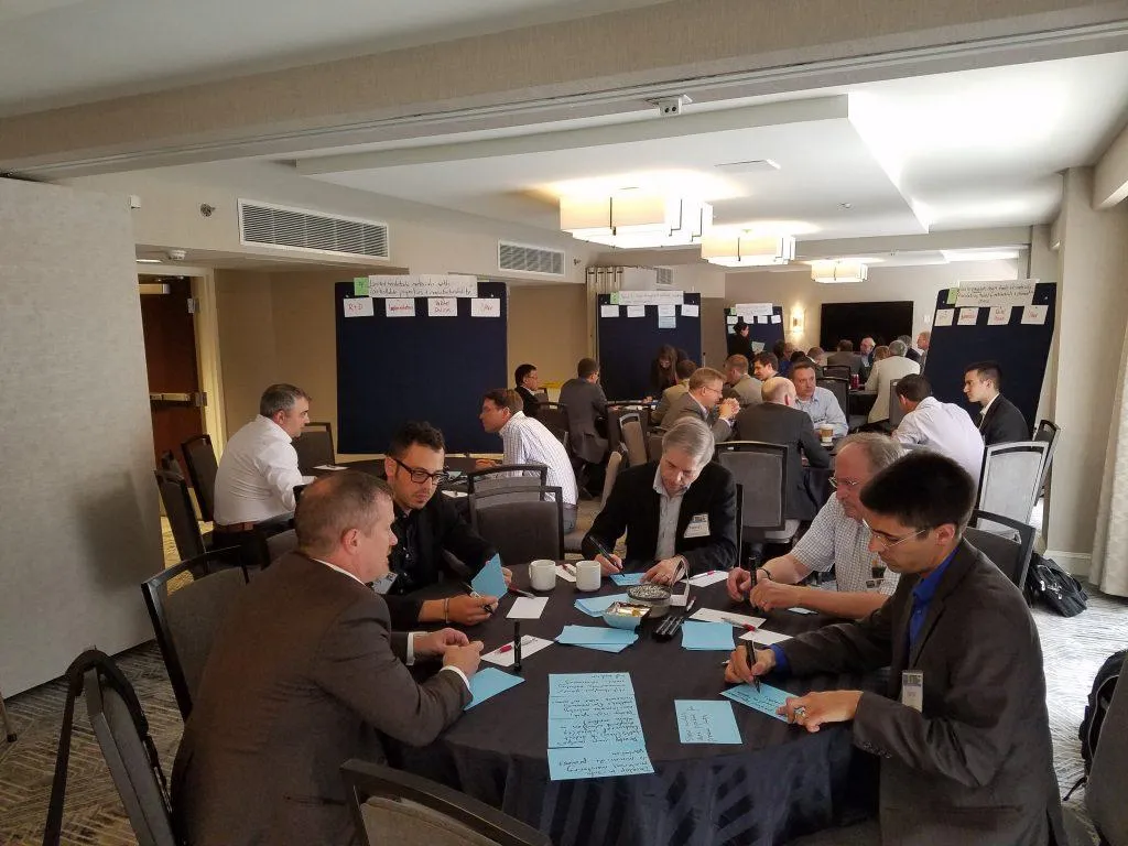 People gathered around a table in a room