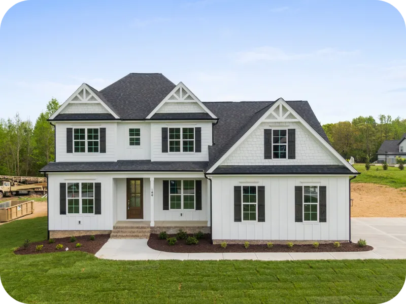 Home inspector evaluating a water heater during a Phase 3 final inspection of a newly constructed home