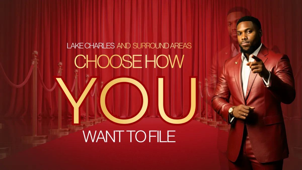 man in white shirt and black pants standing on black concrete bench near white building during