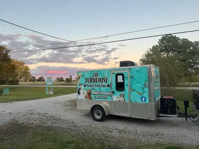 The Turquoise Pooch Paw Spa Mobile grooming tailer unit.