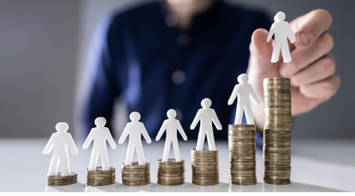 woman in black sweater holding white and black vr goggles