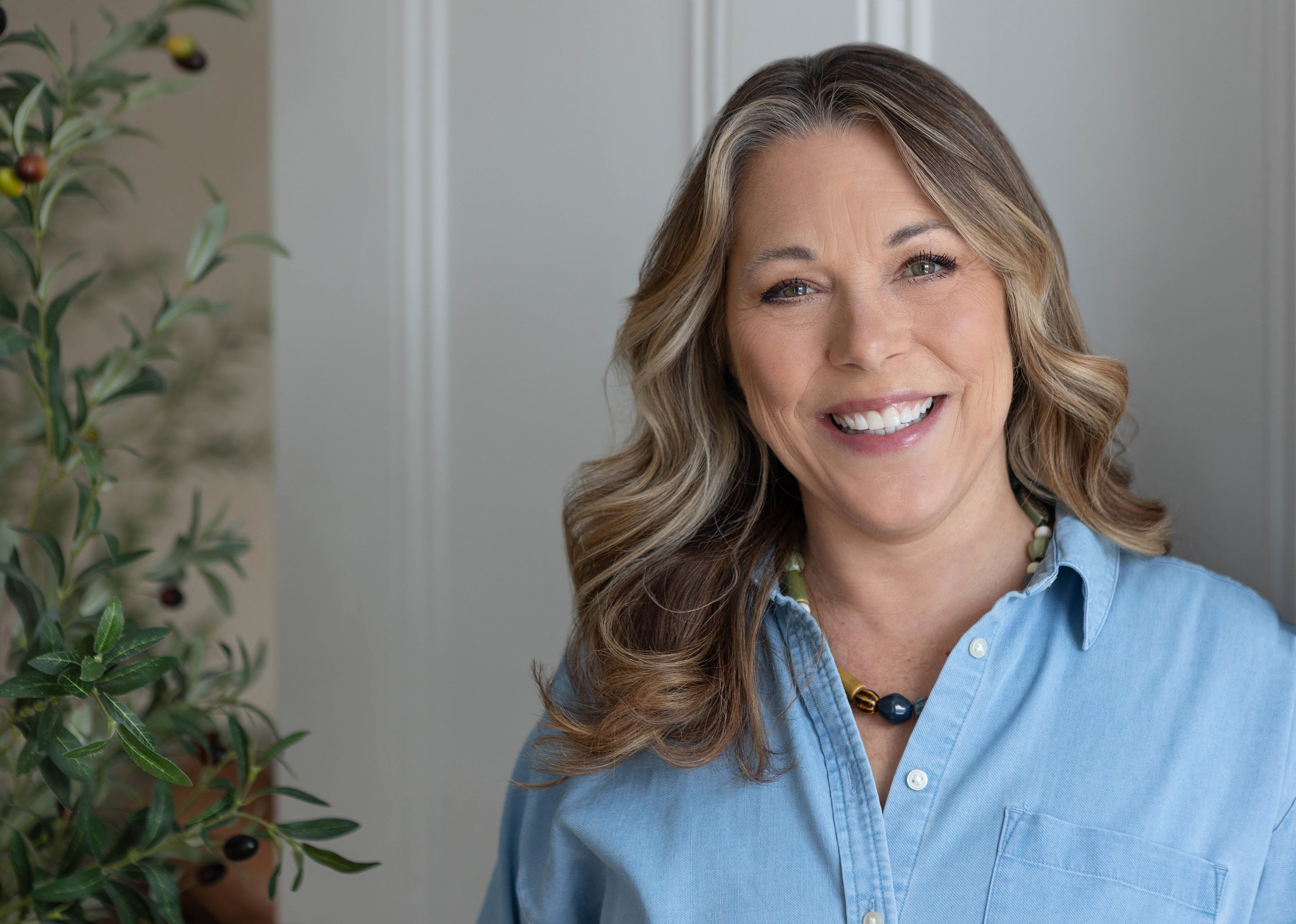 Pasha headshot, looking directly at camera smiling