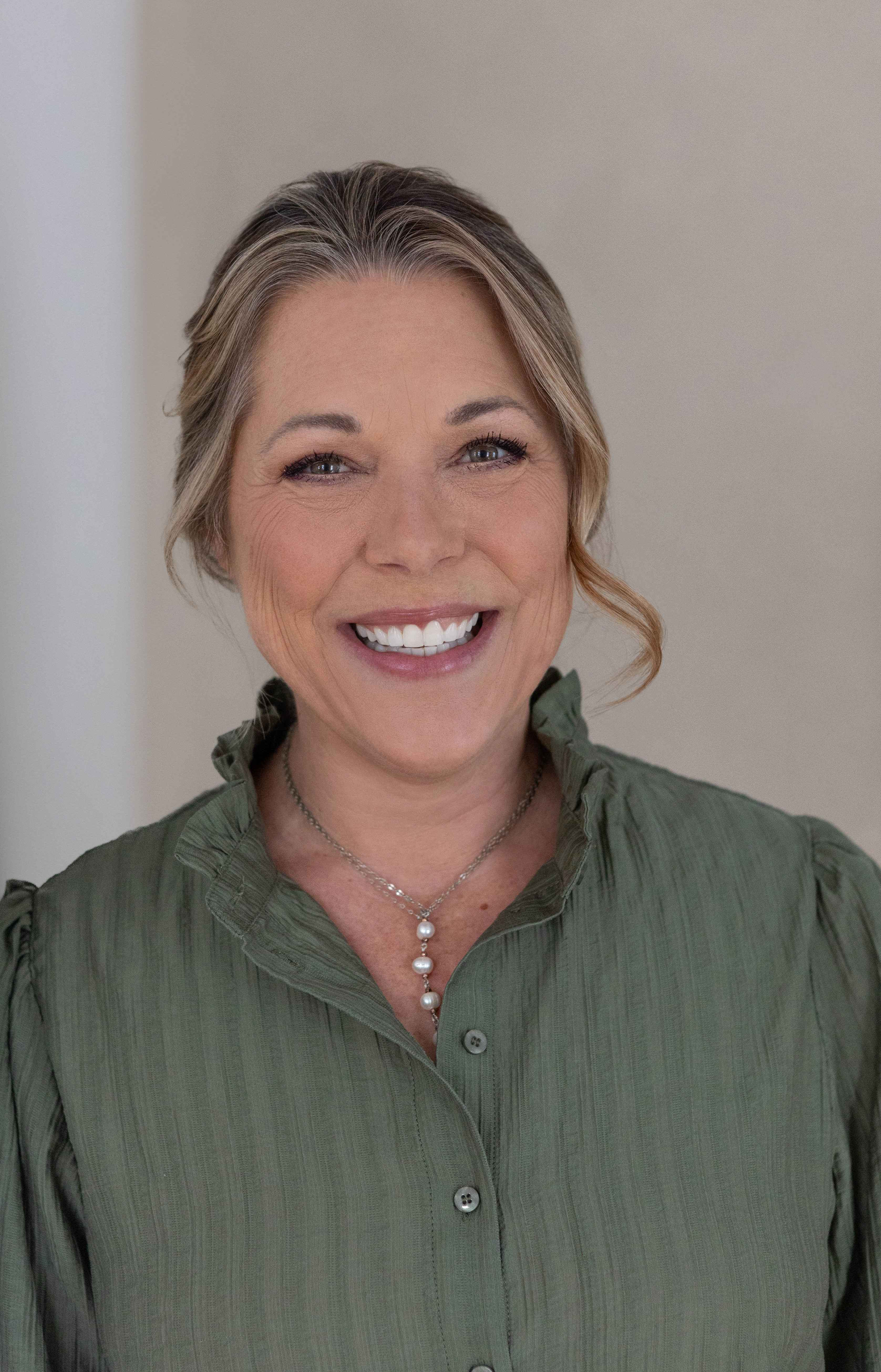 Pasha speaking on stage about how to support a neurodiverse workforce.