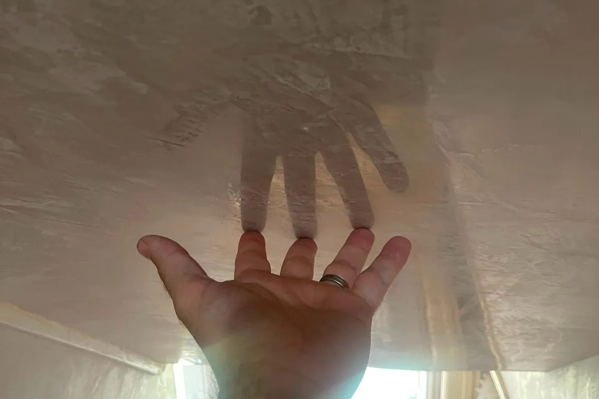 Marble effect plastering in Bishopsworth with hand drawn veining on a bathroom wall