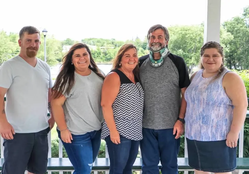 Augusta Georgia family gets help with blue tarp roof repair.