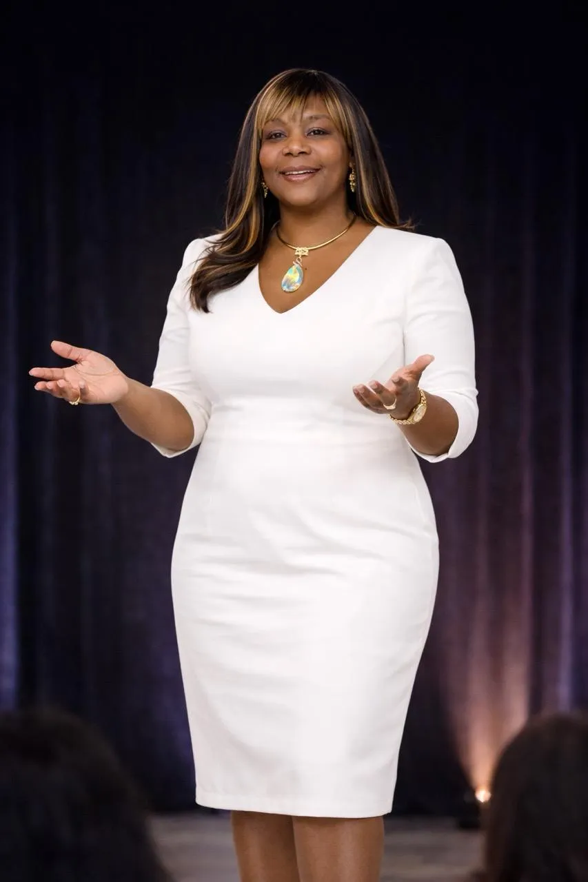 person holding orange flower petals