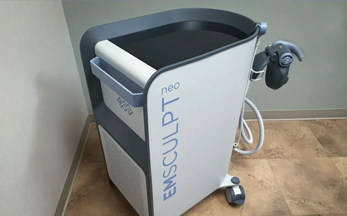 Client receiving Emsculpt Neo body contouring treatment at ContourGlow Wellness