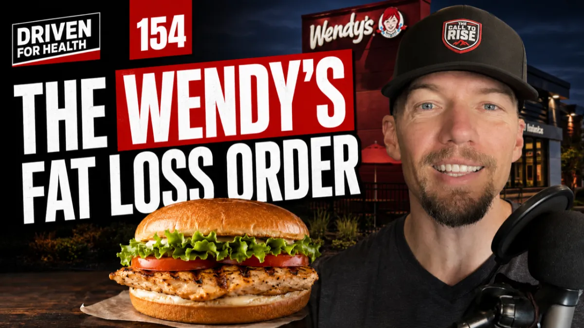 Coach Brian Parana beside a Wendy's grilled chicken sandwich and a small chili, on the Driven For Health episode about what to order at Wendy's for fat loss for men over 40.