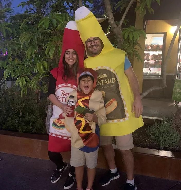 Yas Shirinzadeh of Chaos to Calm in costume with a family and child