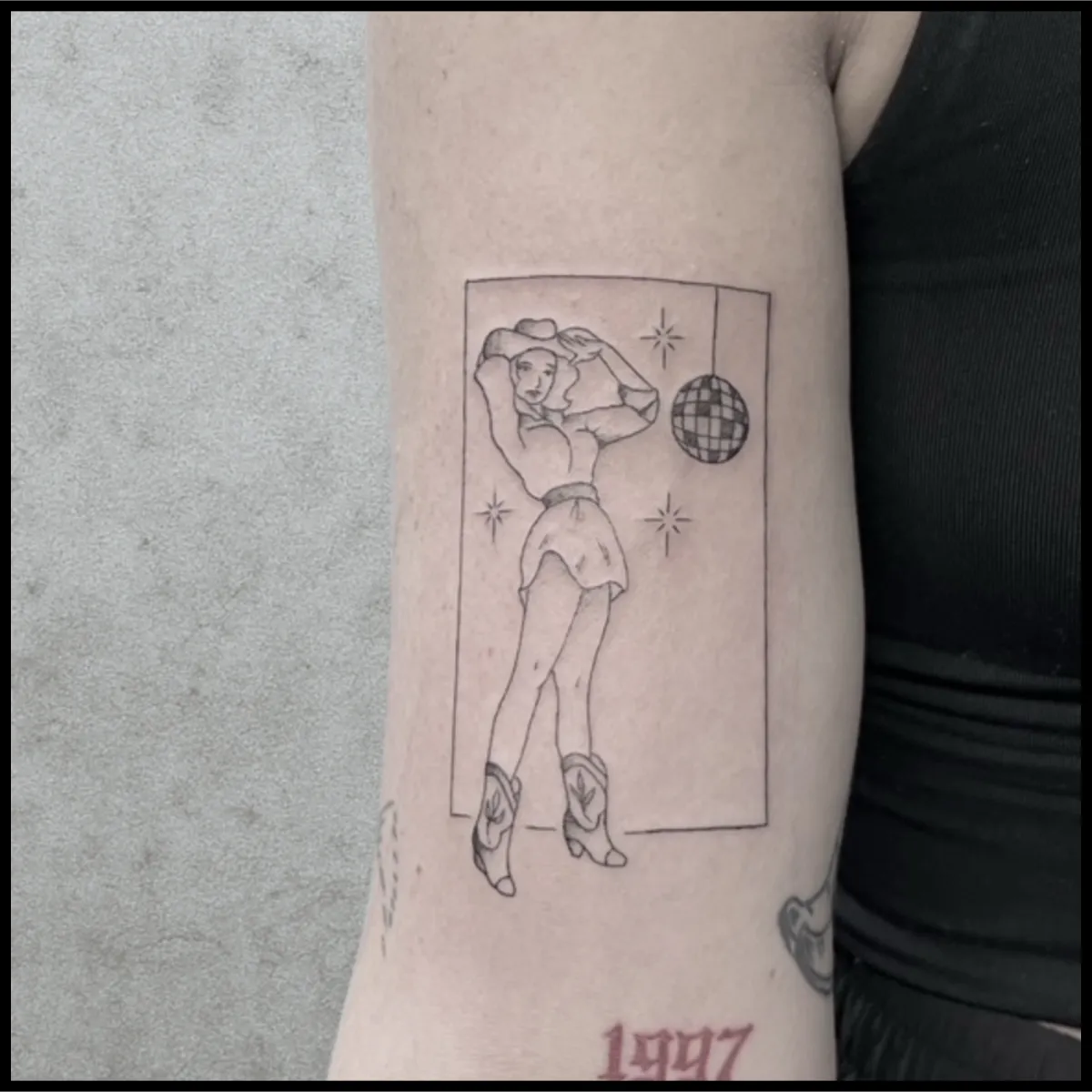 Fine line tattoo cowboy girl at disco