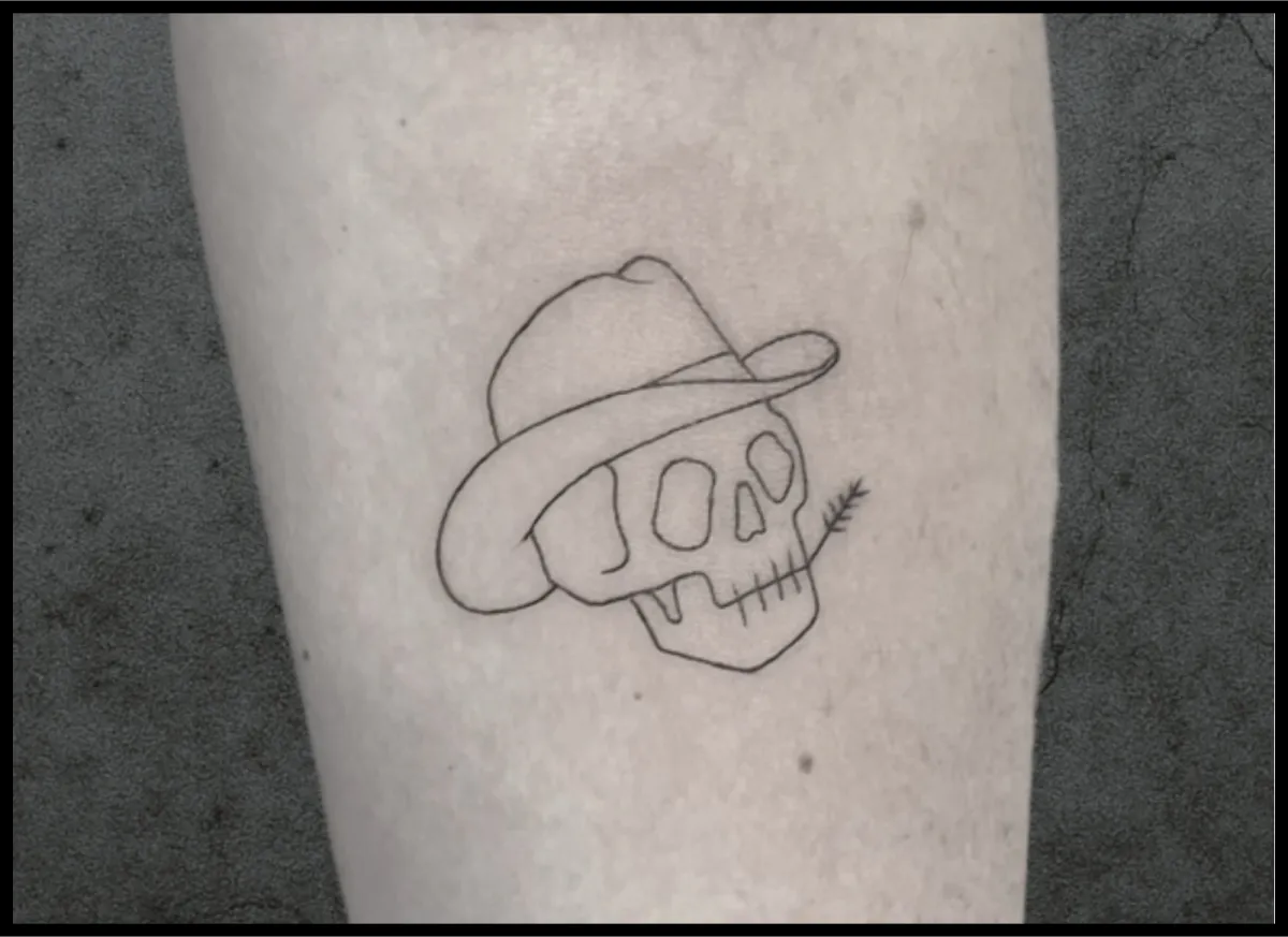 Smoking skeleton fine line tattoo on arm 
