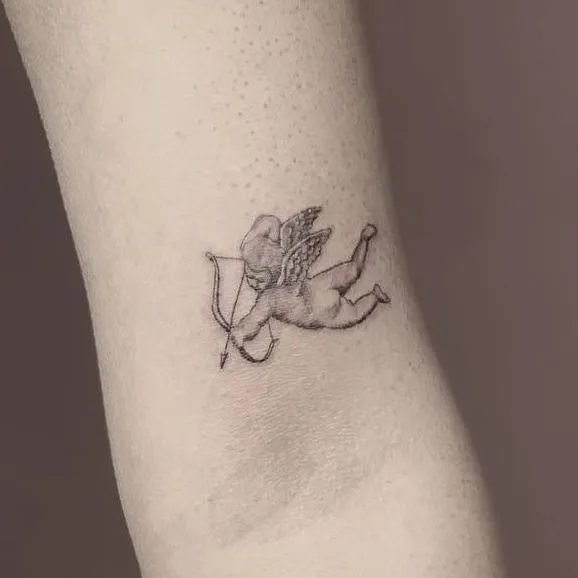 Fine line tattoo cowboy girl at disco
