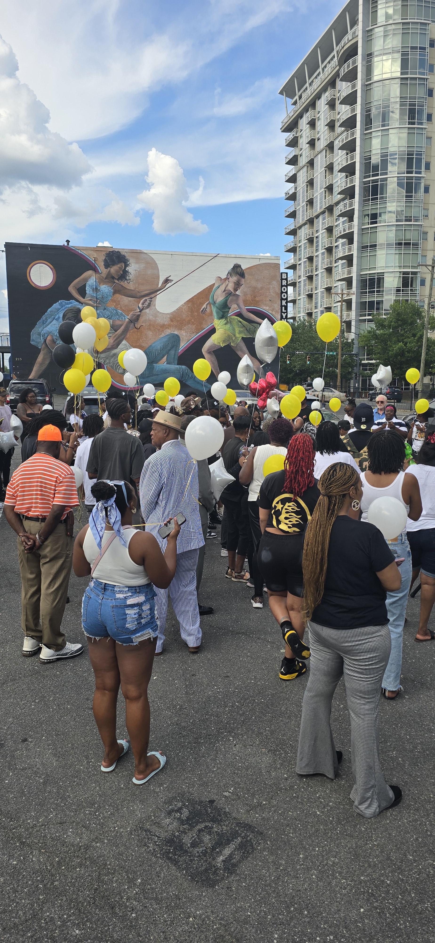 We Are One Charlotte supporting a Family at their balloon release for their murdered son.