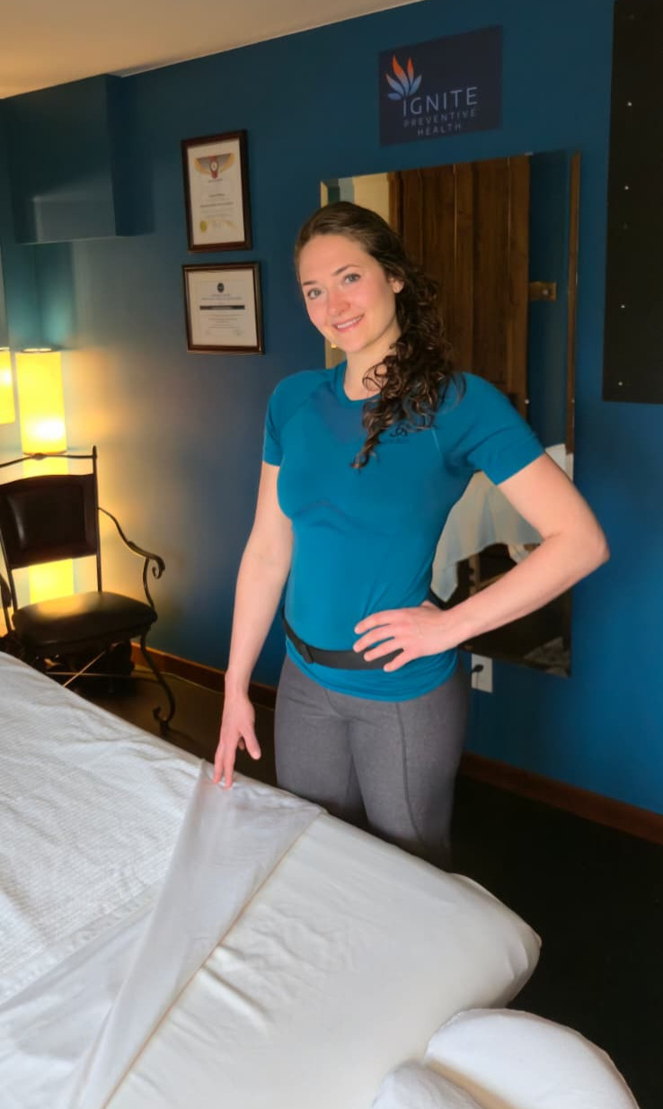 Hands-on massage therapy treatment targeting muscle pain, tension, and restricted movement