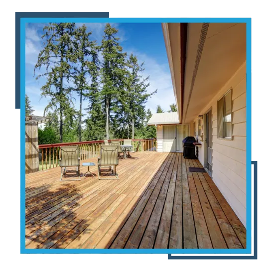 Backyard deck project by a deck builder in Raleigh, NC with clean railing and stairs