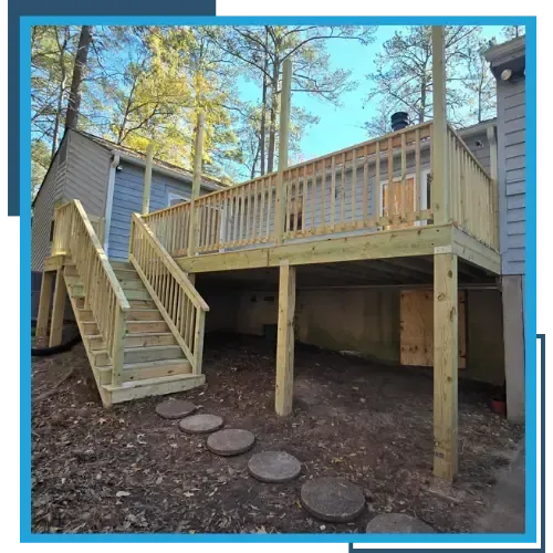 New deck construction and renovation with wooden railings and stairs.
