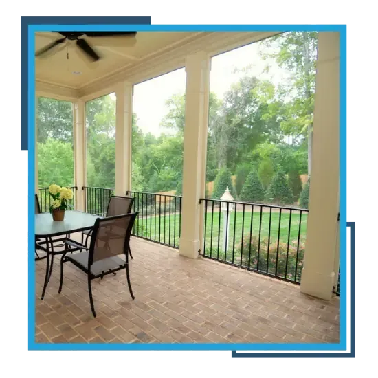 Screened porch with comfortable seating and outdoor dining area, Raleigh NC.