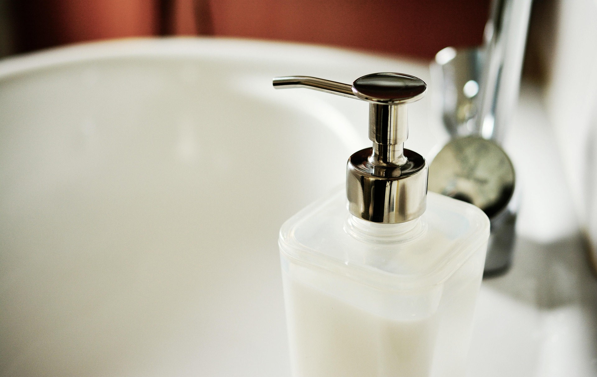 white soap tap on a sink