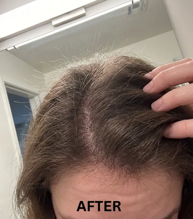 After photo of the same ponytail with increased thickness and shine.