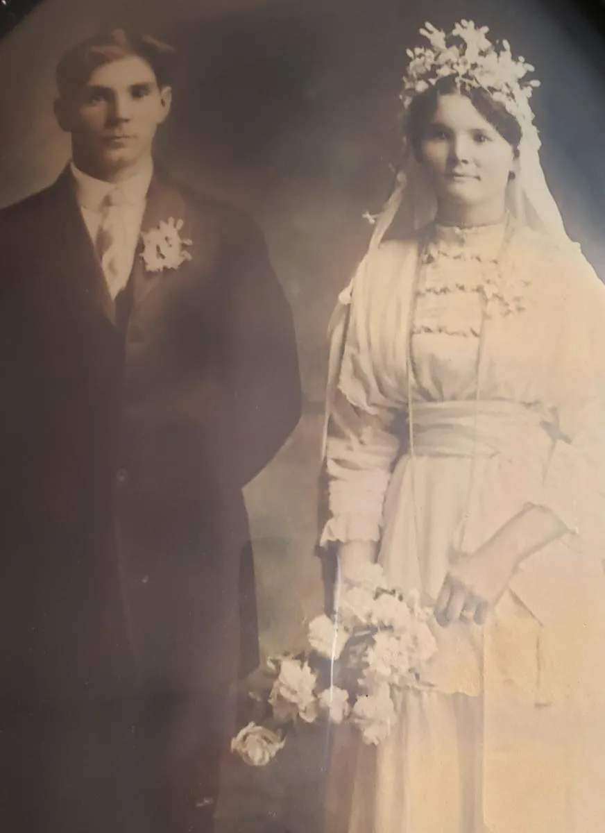 Woman protests to protect veterans with sign.