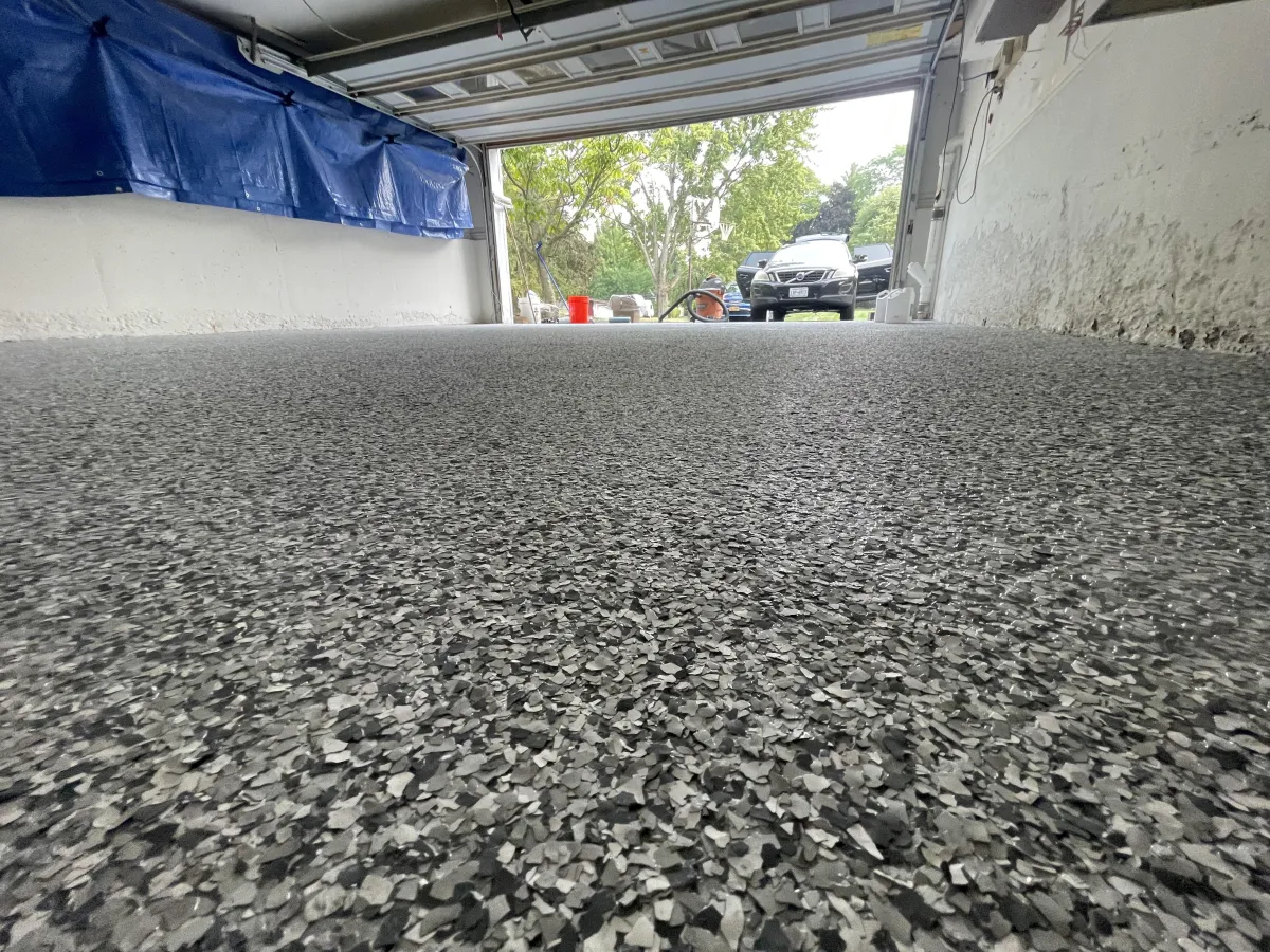 Why Most DIY Epoxy Garage Floors Fail in Rochester Winters – And What Actually Lasts