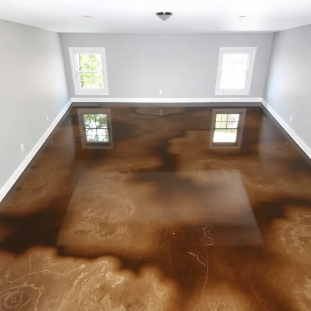 Water damage in a Youngsville, NC home showing soaked floors, warped baseboards, mold, and restoration equipment.