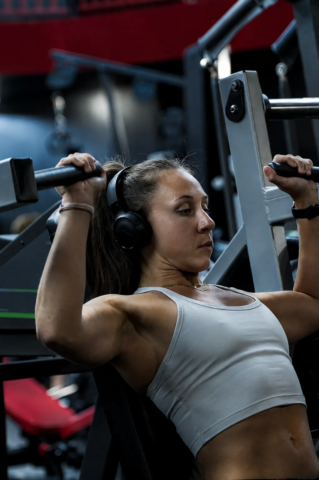 Heavy duty industrial powerlifting equipment in a stark gym setting
