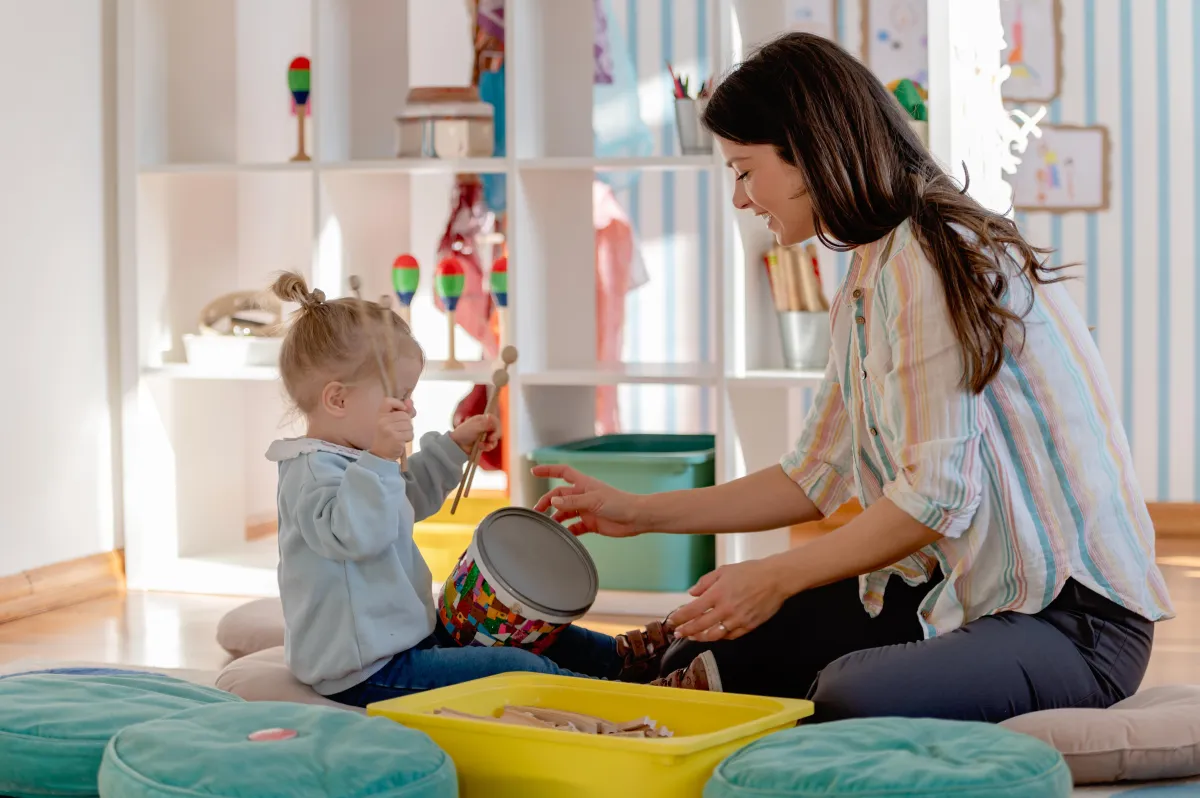 Elderly couple looking at laptop with credit card
