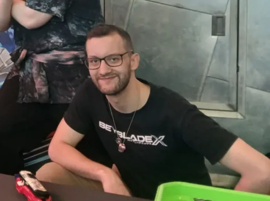 person using computer playing FPS game