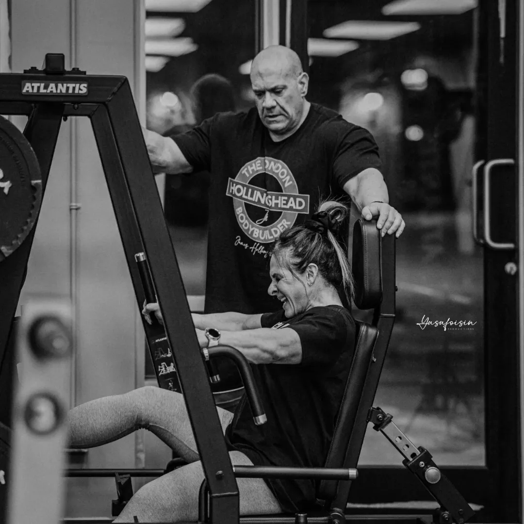 person facing down and holding two rods