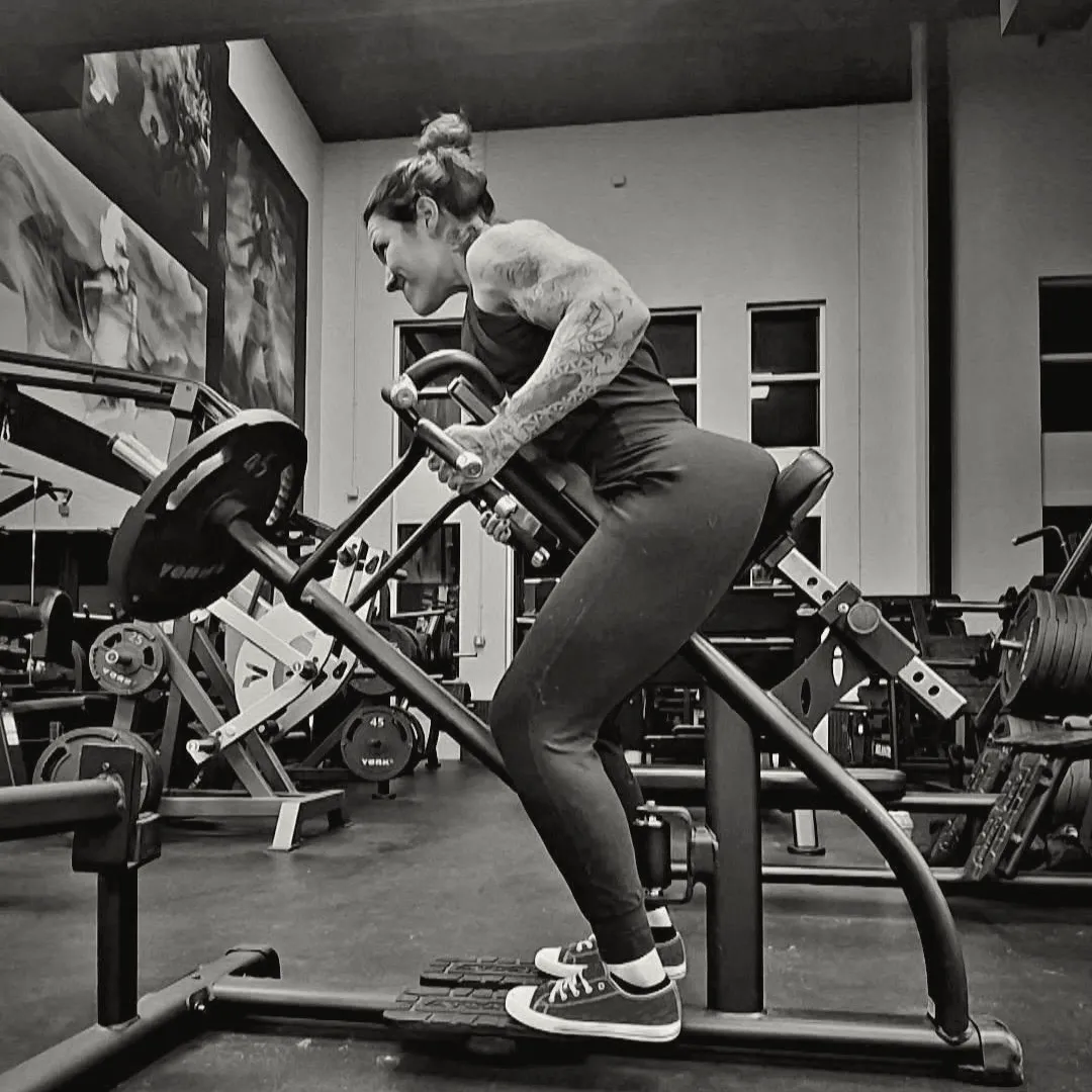 man exercising inside dim room