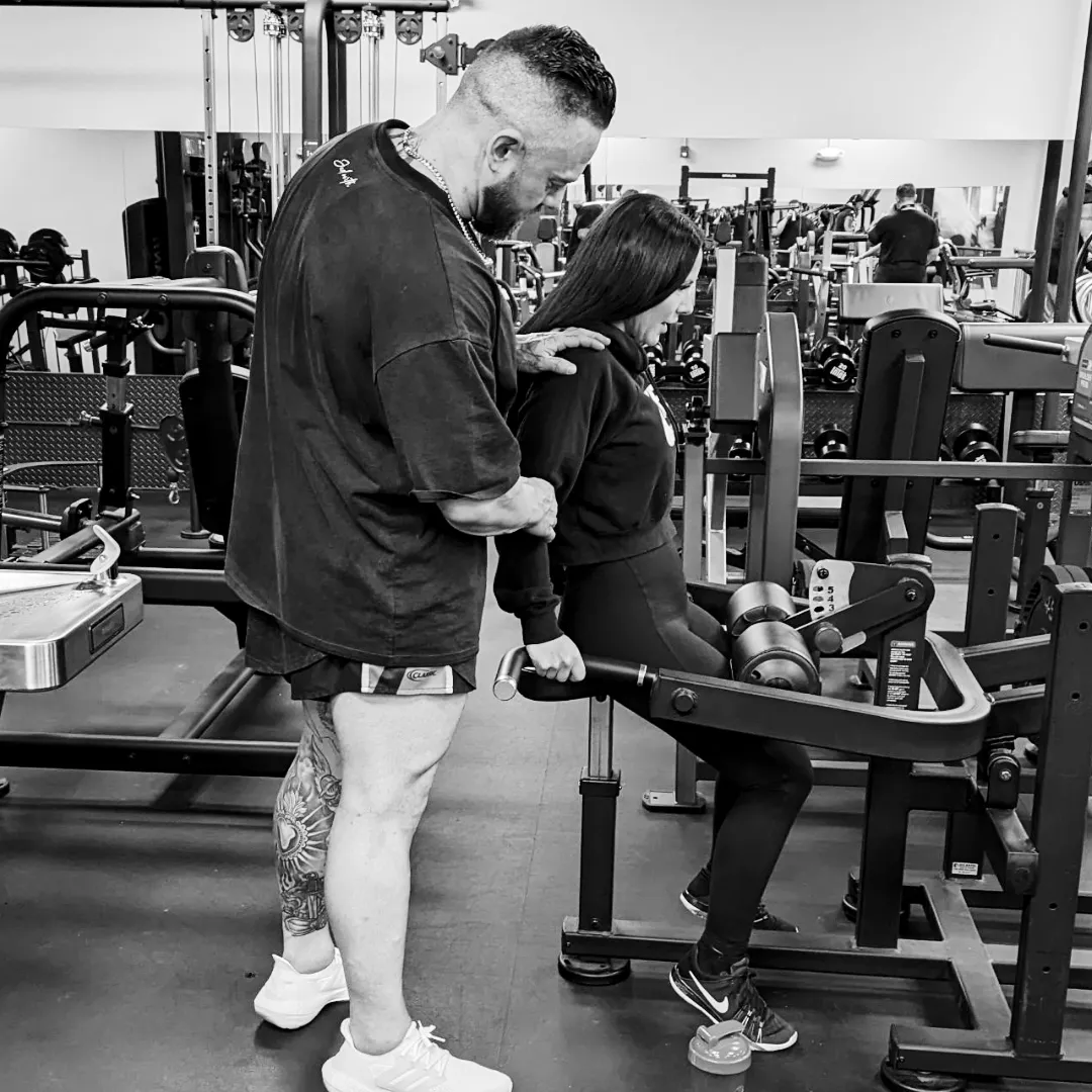 man exercising inside dim room