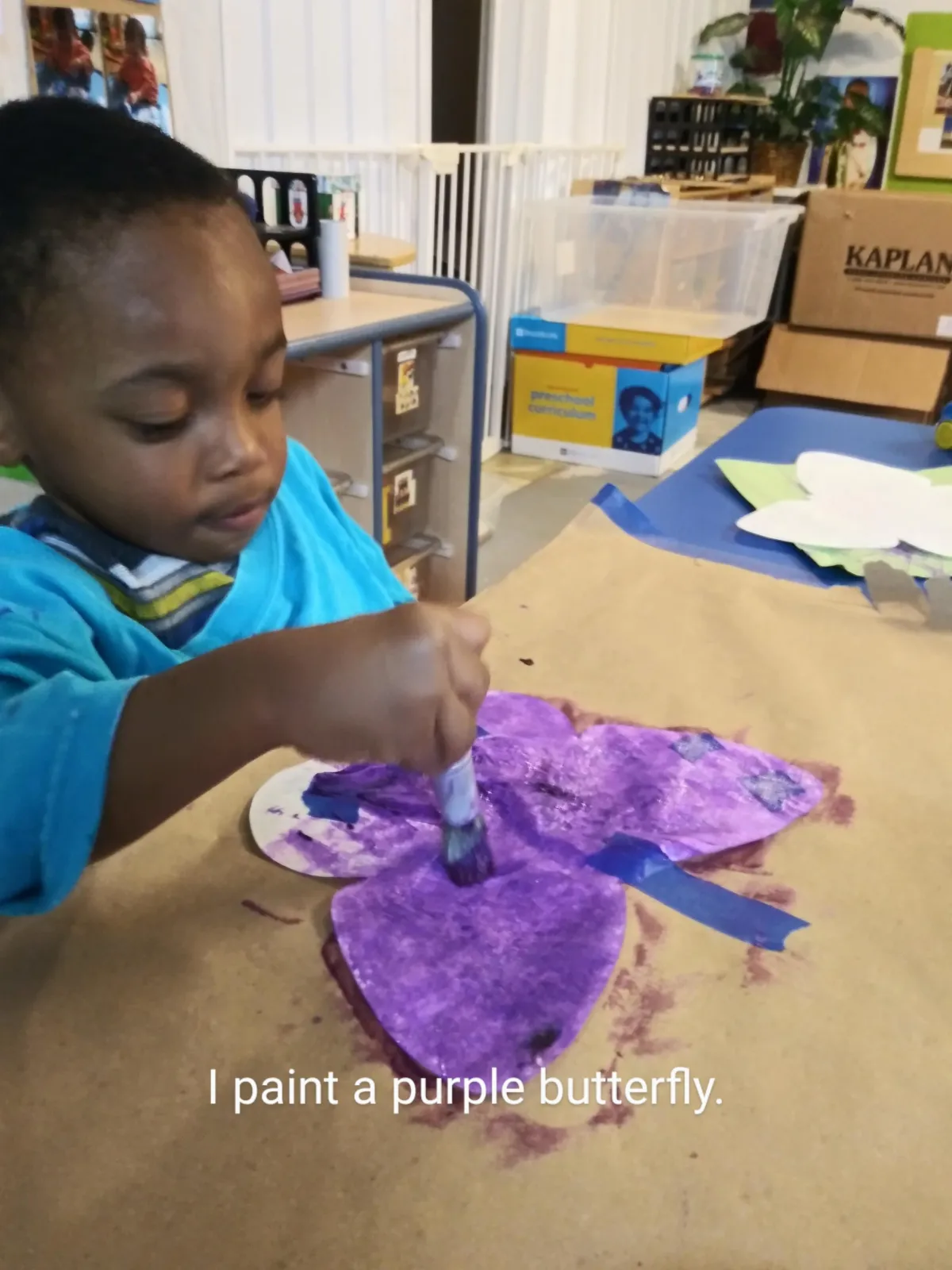 Girl follows directions during arts and crafts time.