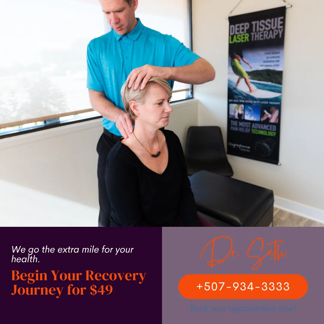 Dr. Seth Nelson performing a cervical spine examination at Rising Sun Chiropractic.