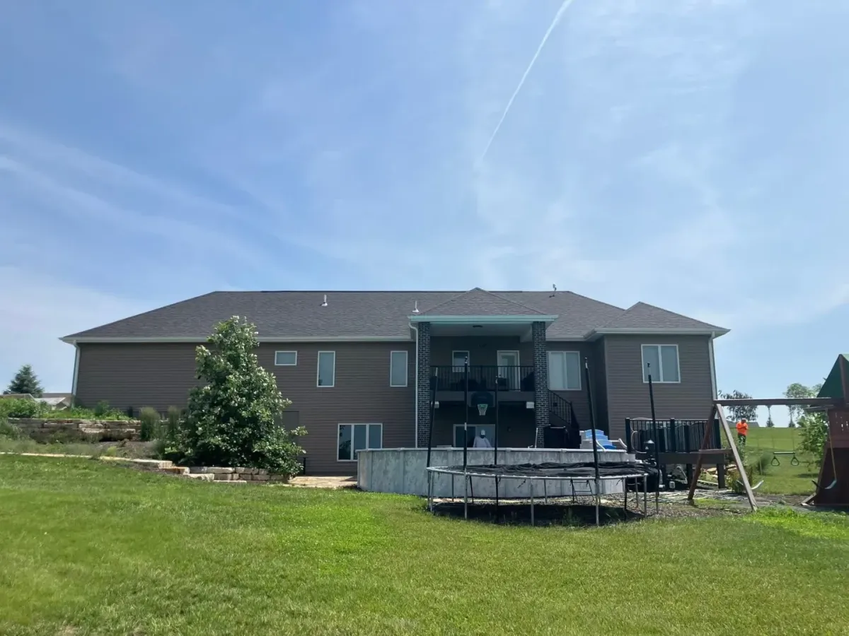 roof estimates Palmyra NE — inspector measuring roof — Knapp Roofing LLC