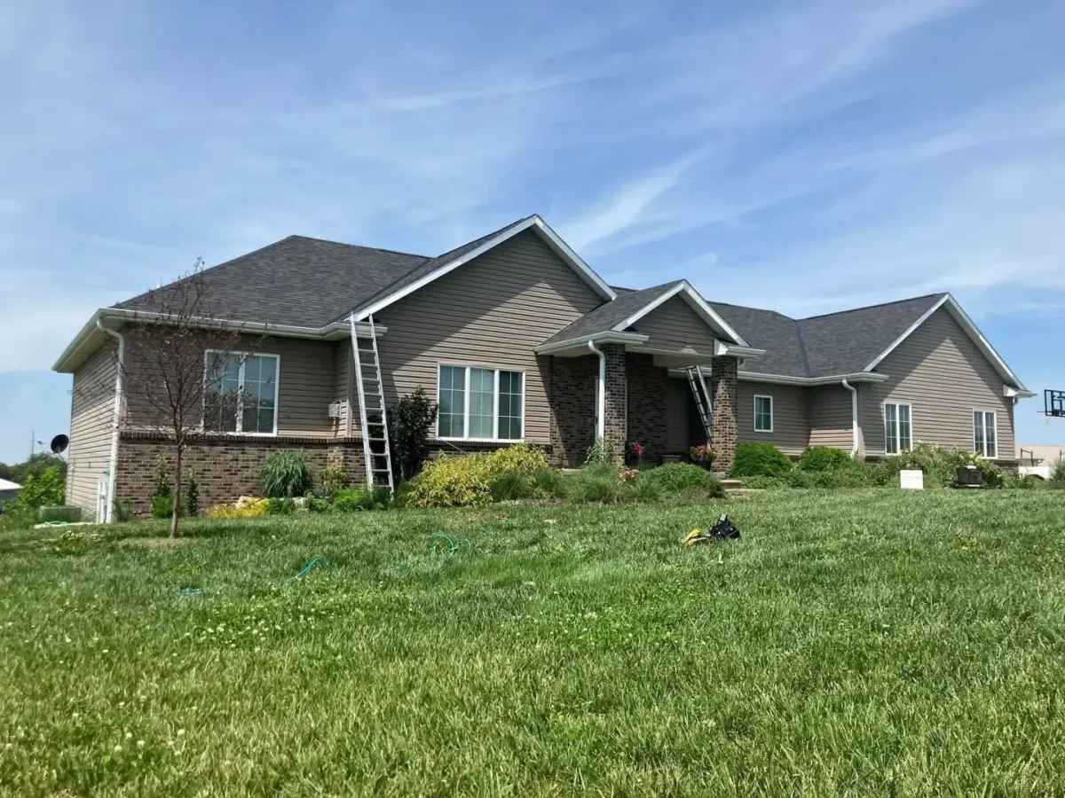 Roof replacement Union NE — crew installing shingles on home — Knapp Roofing LLC