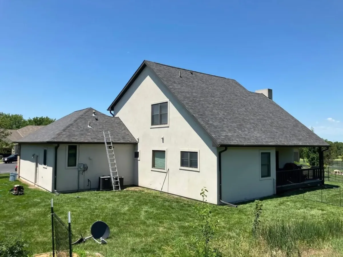 Roofing contractor Nebraska City NE — crew on ladder at eaves — Knapp Roofing LLC