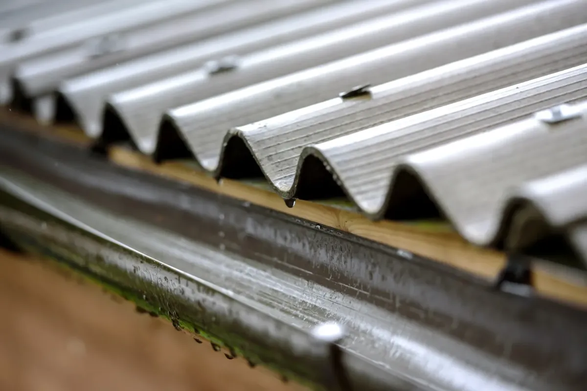 Guttering services Dunbar NE — crew installing seamless gutters on home — Knapp Roofing LLC